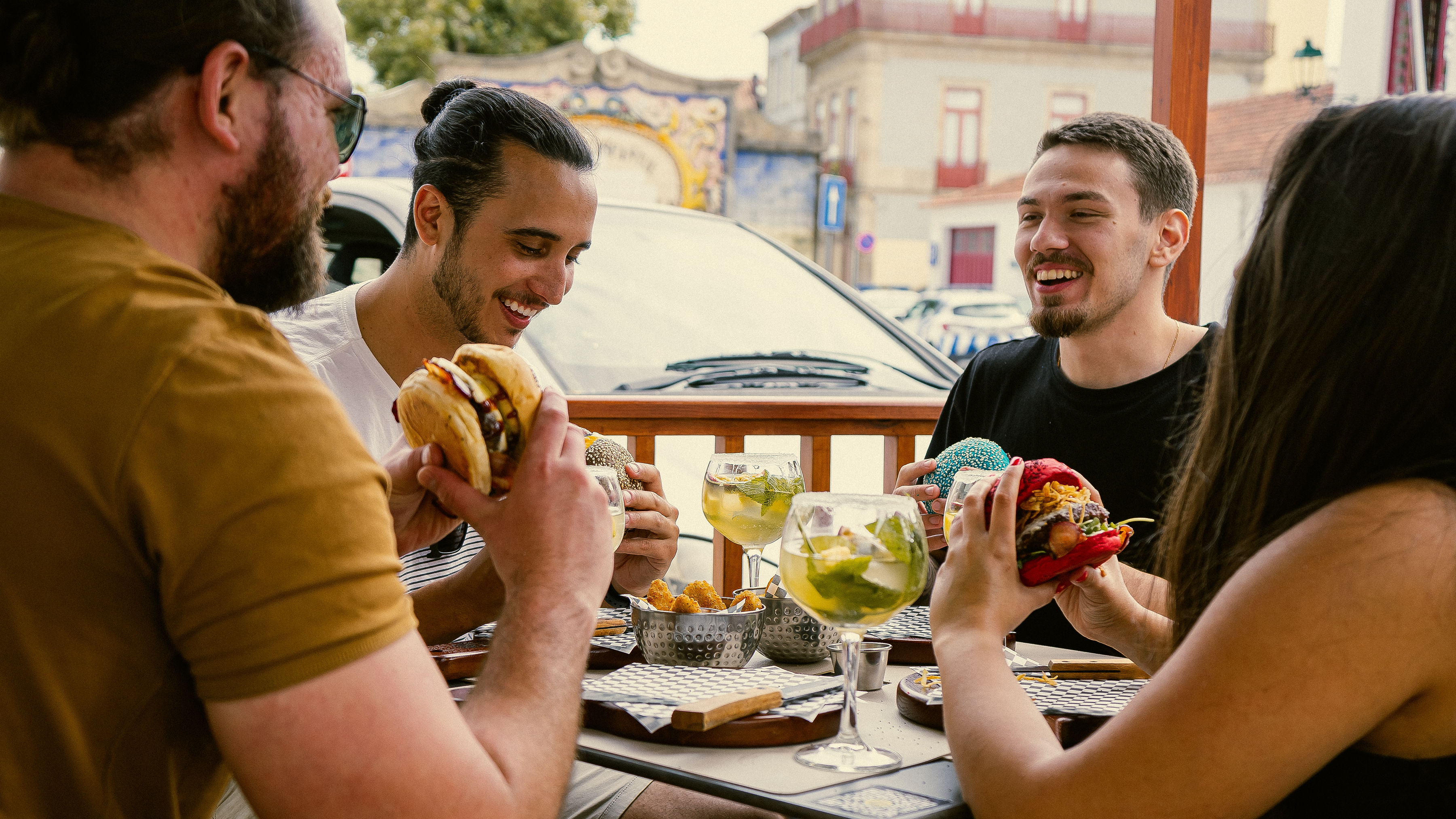 Friends enjoying DARZ! burgers